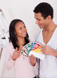 Photo: African Couple Choosing Color For New Home African Couple Choosing Color For New Home