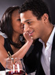 Foto: Woman Whispering To Boyfriend's Ear Woman Whispering To Boyfriend's Ear