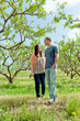 Photo: Couple Walking During Spring Couple Walking During Spring