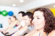 Group of people in the gym doing cardio training