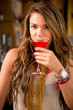 Woman drinking a cocktail