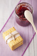 Fresh baked biscuits and red fruit jam