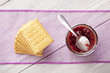 Fresh baked biscuits and red fruit jam