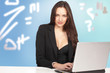 Pretty scientist with busy expression in office