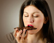 Photo: Woman with with a chocolate bar Woman with with a chocolate bar