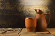 Earthenware mug and pitcher