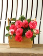 Photo: flowers roses in a vase on wooden background flowers roses in a vase on wooden background