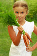 Gardening, vegetable - lovely girl with bunch of carrots