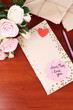 Writing letter of congratulations to mother's Day