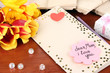 Writing letter of congratulations to mother's Day