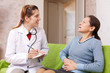   mature woman complaining  to doctor