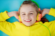 Young girl with headphones enjoying music
