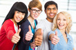 Students giving the thumbs-up sign