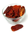 dried tomatoes in a glass bowl