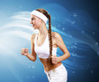 Photo: Young pretty woman in sport wear running Young pretty woman in sport wear running