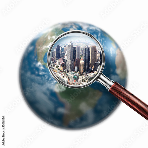 Photo: conceptual mini planet with a city on it conceptual mini planet with a city on it