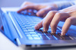 Click! Hands of a man on keyboard