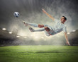 Photo: football player striking the ball football player striking the ball