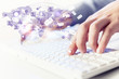 Click! Hands of a man on keyboard