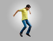 Young man dancing and jumping