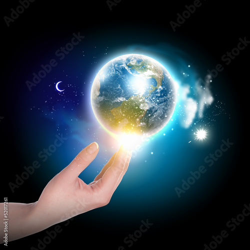 Photo: hand touching the earth hand touching the earth