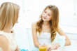 Foto: Young woman with a glass of drink Young woman with a glass of drink
