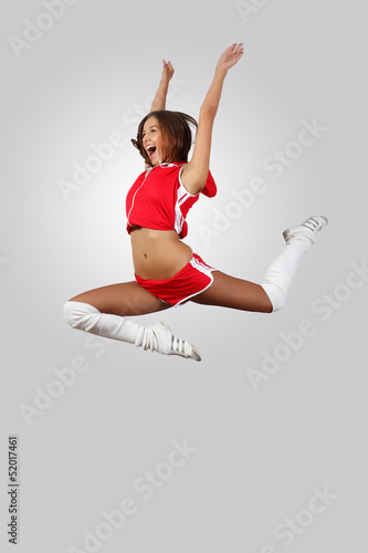 Photo: Young female dancer against white background Young female dancer against white background