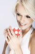 Photo: Beautiful woman enjoying a mug of coffee Beautiful woman enjoying a mug of coffee