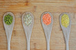 Mung beans, green buckwheat, lentil and bulgur in wooden tablesp