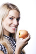 Photo: Healthy blond woman with an apple Healthy blond woman with an apple