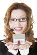 Photo: Call center assistant woman with house model Call center assistant woman with house model