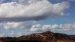 Clouds and mountains zoom time lapse
