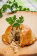 Baked bread stuffed with cabbage and mushrooms