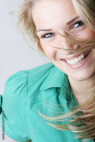 Photo: Vivacious laughing blond woman Vivacious laughing blond woman