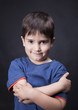 Portrait of a boy with a skeptical look