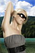 Photo: Beautiful woman enjoying the summer sun Beautiful woman enjoying the summer sun