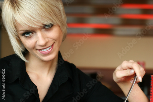 Photo: Young blond woman with a gentle smile Young blond woman with a gentle smile