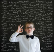 All ok boy dressed as business man with chalk questions