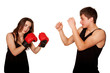 The girl beating the guy, the guy defending himself.