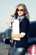 Young businesswoman with financial papers