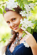 Photo: Beautiful woman in a spring garden Beautiful woman in a spring garden