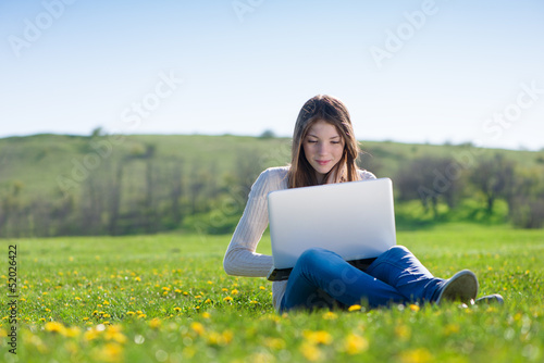 Photo: girl with laptop girl with laptop