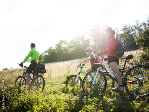 Photo: family cycling outdoors family cycling outdoors