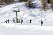 Group of Skiers using Drag Ski Lift