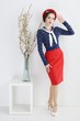 Foto: Beautiful pin up lady standing Beautiful pin up lady standing