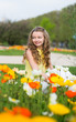 Photo : Girl with beautiful colorful poppies Girl with beautiful colorful poppies