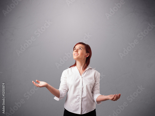 Photo: beautiful young lady juggling with copy space beautiful young lady juggling with copy space