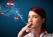 Young woman smoking dangerous cigarette with no smoking signs