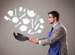 Handsome man with kitchen accessories icons