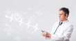 Doctor examinates heartbeat with abstract heart